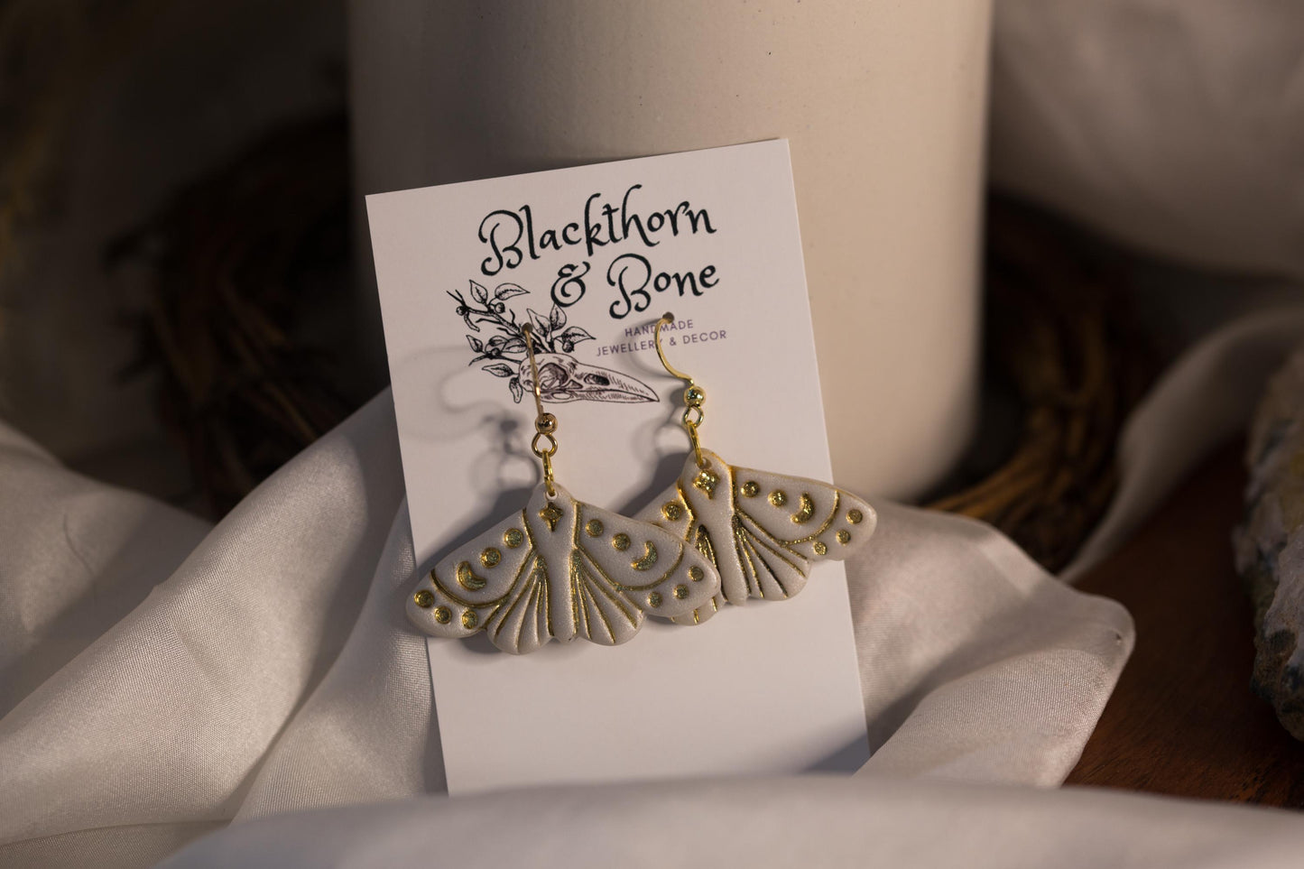 Pearlescent White Moth Embossed Statement Earrings