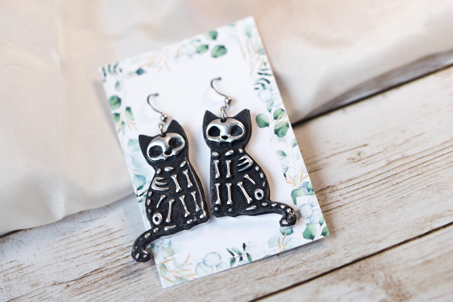 Black and Silver Skeleton Cat Earrings