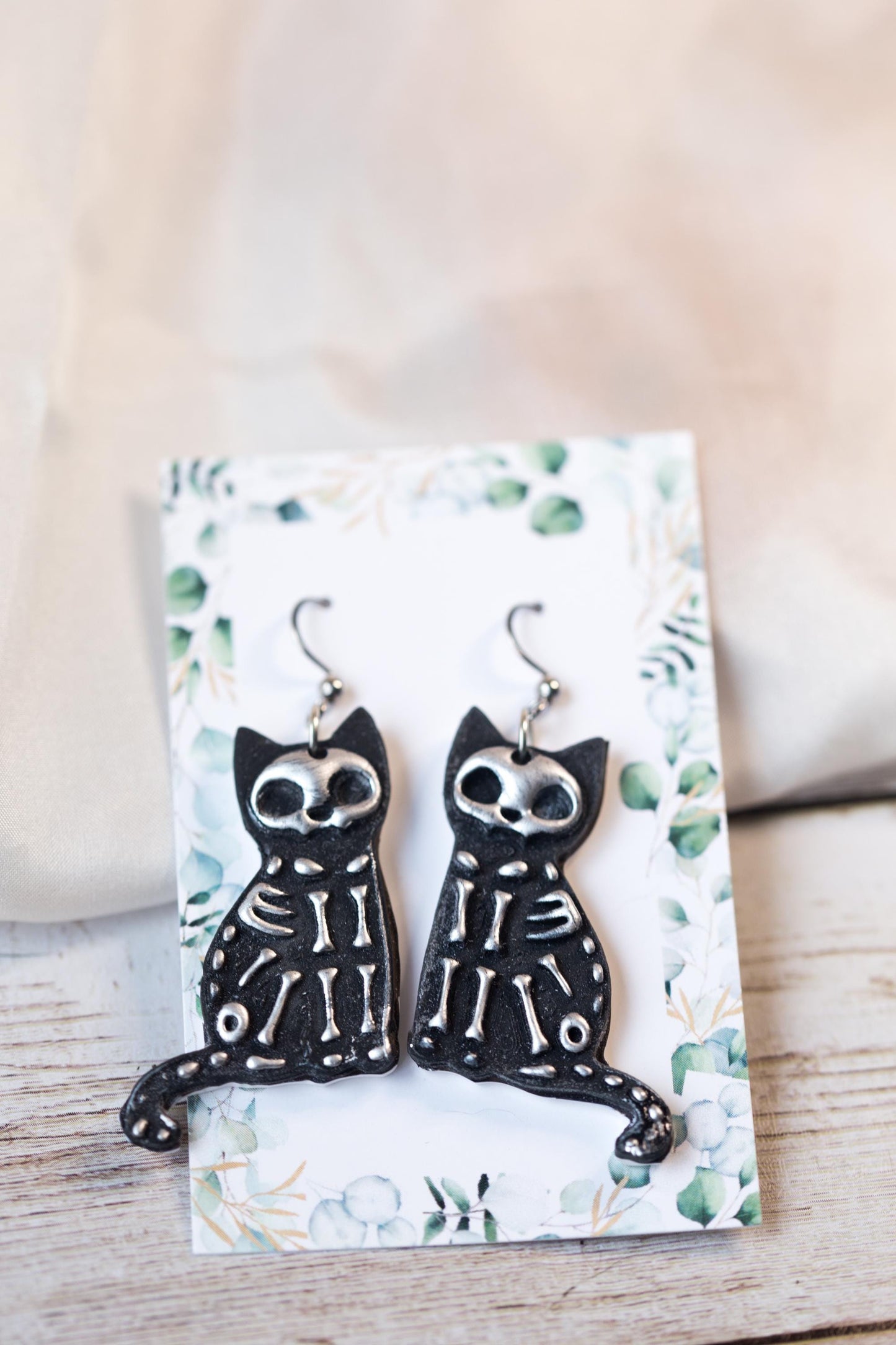 Black and Silver Skeleton Cat Earrings